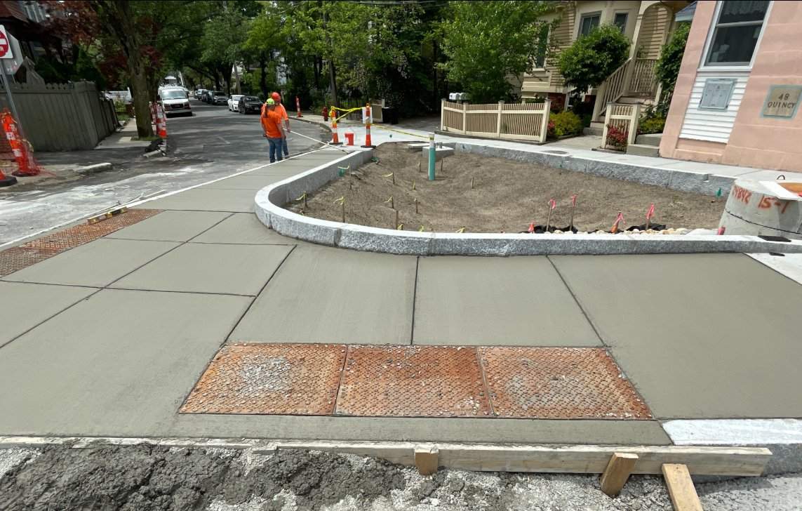 New sidewalks poured today around the Quincy/Summer Street bioretention basin.