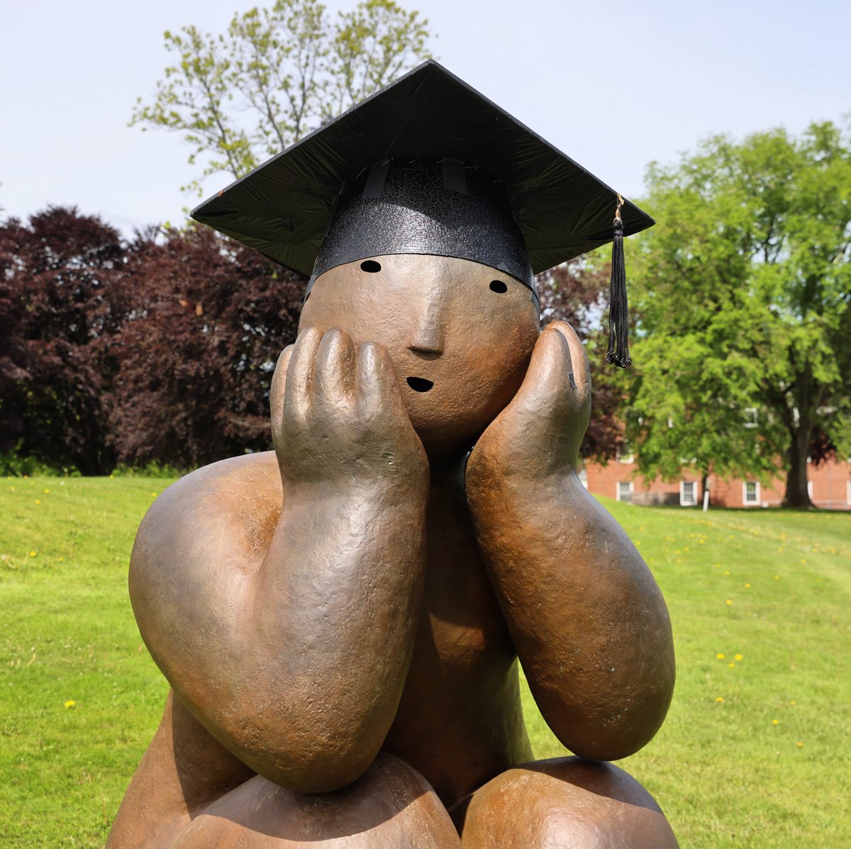 Joy Brown’s sculpture is patiently waiting for Friday’s graduation ceremony. 🎓