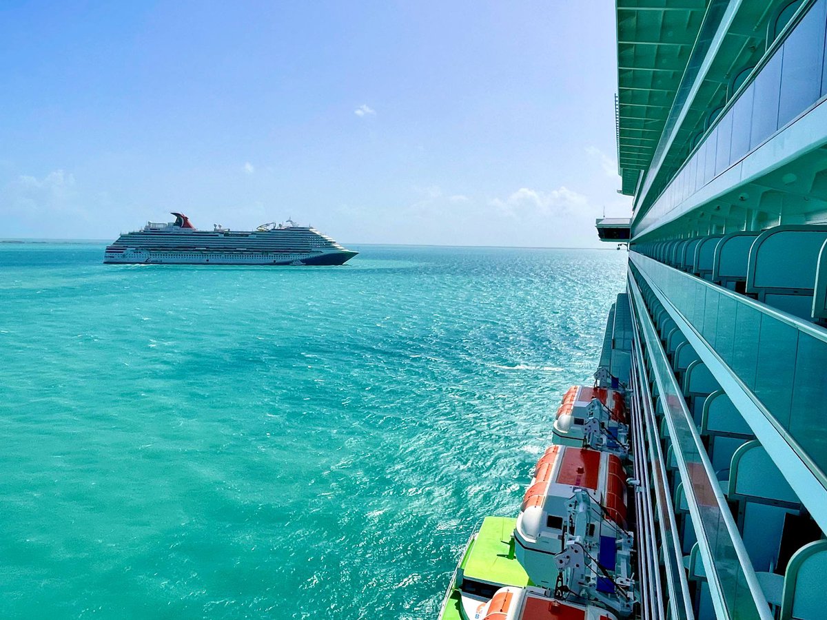 In Port Today: Enchanted <a href="/PrincessCruises/">Princess Cruises</a> and <a href="/carnival/">m.</a> Dream, left, each at anchor today off the coast of Belize.
Image courtesy mike.coleman.travels on Instagram.