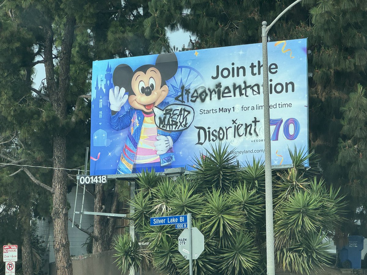 Someone defaced the Silverlake Disney billboard and Mickey is telling people to read Marx