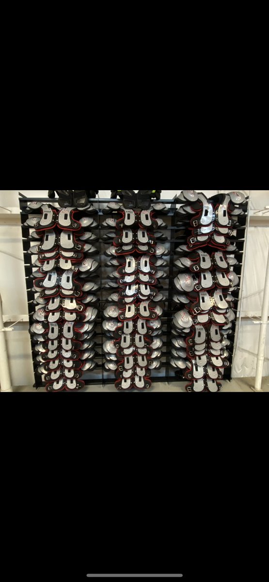 Coach__Phillips's tweet photo. @Coach_Mathieson I made some shoulder pad racks for ours. I need to make several more sections, but it beats stacking them. I could probably sell a ton of these if I had time to make them. https://t.co/UEafLQKXvb