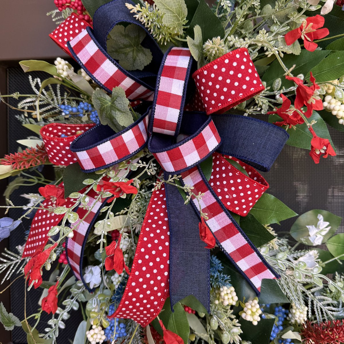 Wreath to show your patriotism in red white and blue. The handcrafted wreath would make a lovely decoration to have on your door in celebration of the US 250 birthday. 

Visit sucasaencantada.etsy.com to see this wreath and other decor pieces.