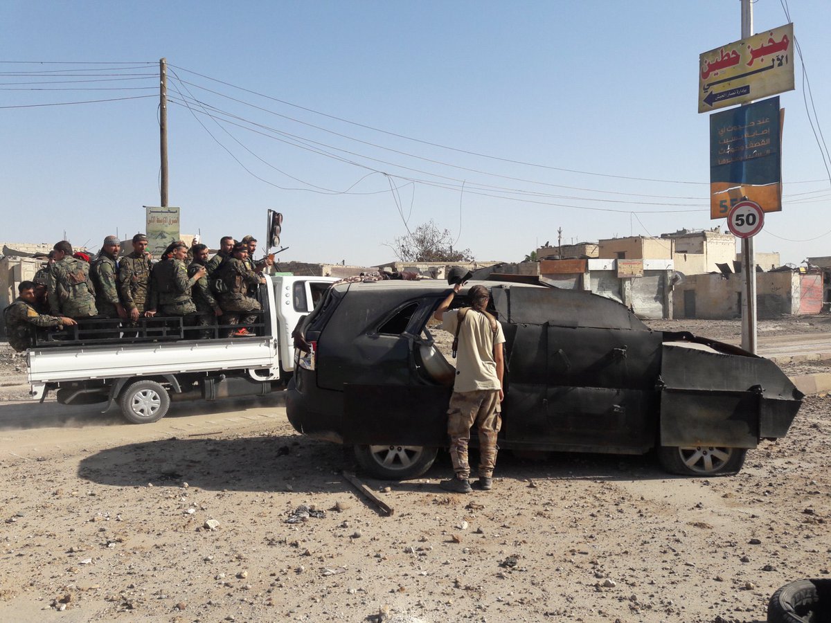 IS up-armored SVBIED (SUV w/ black environmental camo) captured by SDF in Eastern Raqqah in October, 2017. Photographed by <a href="/JohnDuttenhofer/">John Duttenhofer</a>