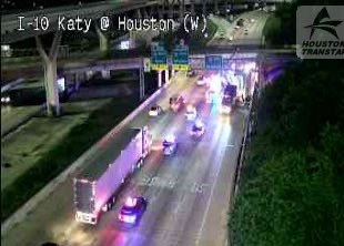 Update: I-10 eastbound at Houston Ave bridge. Truck has been freed from bridge. Crews will still need to inspect bridge. Multiple mainlanes still blocked.