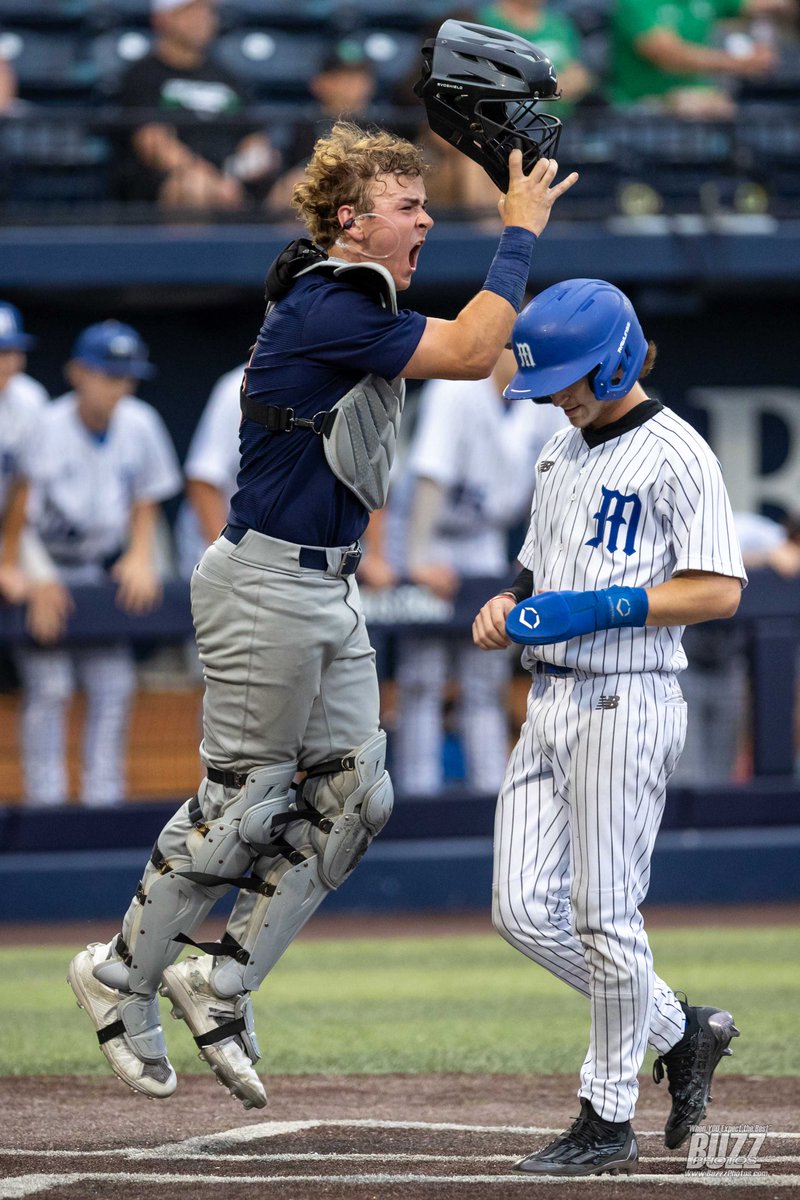 McKinney North Bulldogs - media photos by Kevin Bartram of BuzzPhotos.com. Coach Gatewood is on top of this play. Bulldogs won 6-5 in 8 innings. Catcher Brady Shelton celebrates after the last strike of the game.