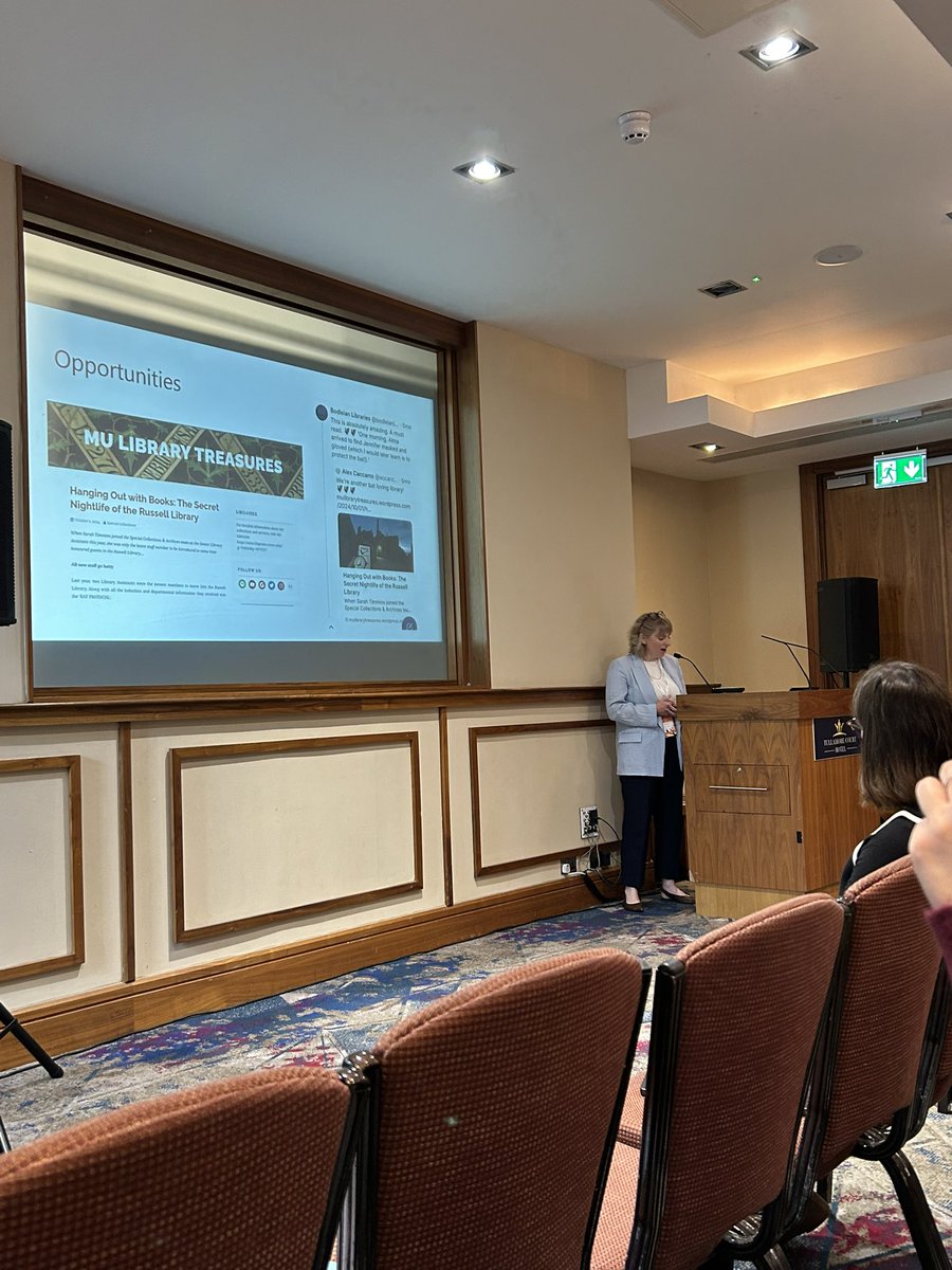 Fiona Morley Clarke (@morleyfme) on Twitter photo <a href="/library_MU/">Maynooth University Library</a> colleagues Alex Caccamo and Sarah Timmins speaking on Bookish Bats: a unique sustainable delivery service in the Russell Library at #conul25 <a href="/library_MU/">Maynooth University Library</a> colleagues Alex Caccamo and Sarah Timmins speaking on Bookish Bats: a unique sustainable delivery service in the Russell Library at #conul25