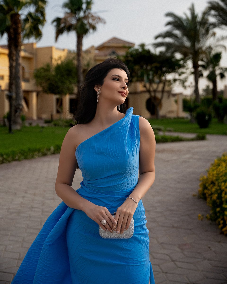Sara Barakah feeling blue in the best way, wearing Gemy Maalouf Resort 2025.

#GEMYMAALOUF