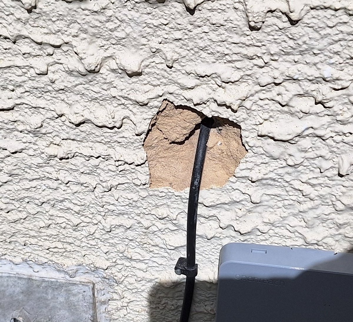 PummyKin's tweet image. Thanks @bt_uk for your contractors Open Reach who have not only left this mess in my wall but they now expect me to pay for it and claim it back. Never mind that I can't actually afford to repair their damage!! 😠