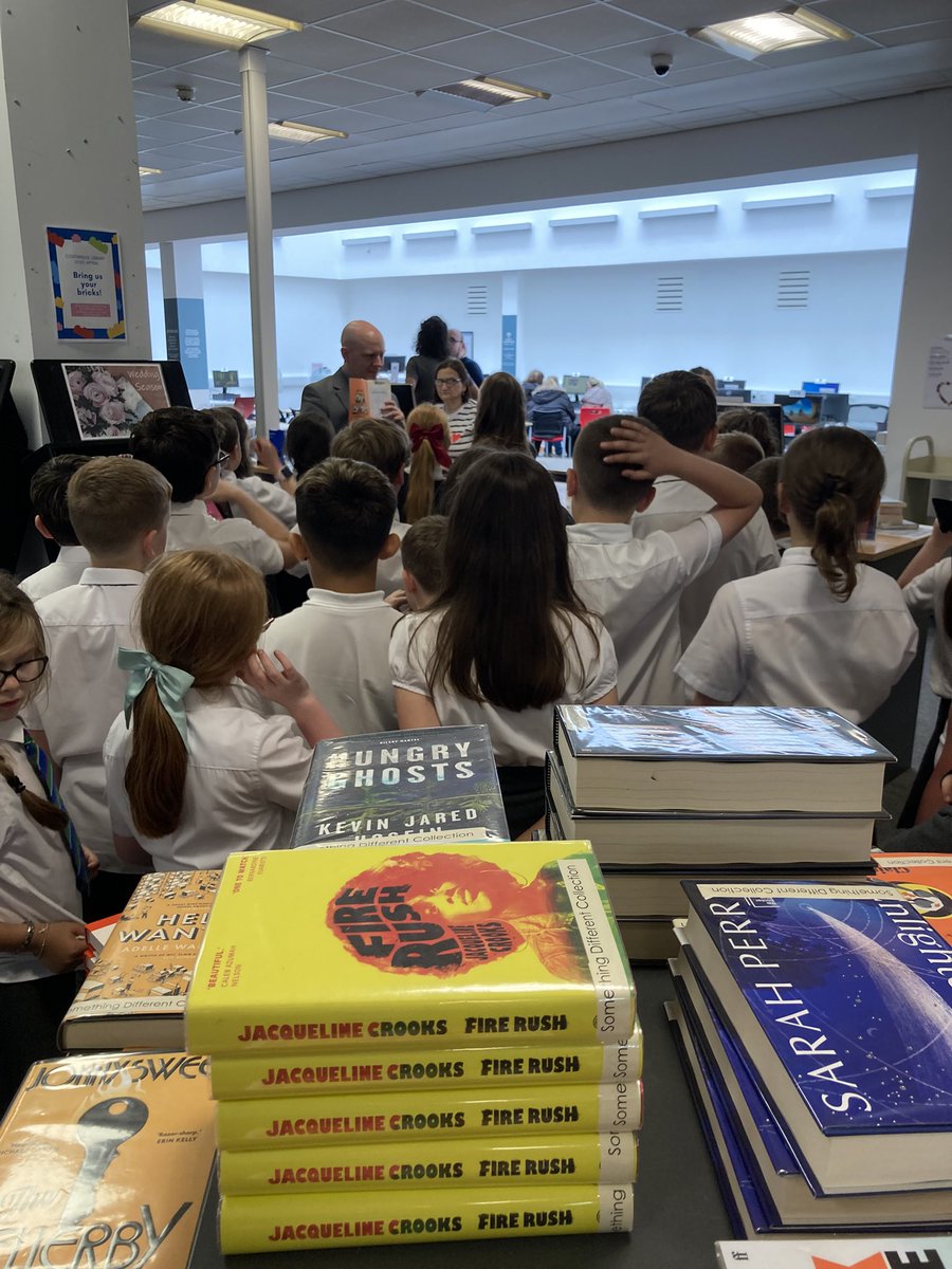 StAugustine_PS's tweet photo. P5 were shown around, and how to use, Coatbridge library today. Hopefully it will be the start of many visits for them to enjoy reading #staugread https://t.co/4W1w5zkqjt