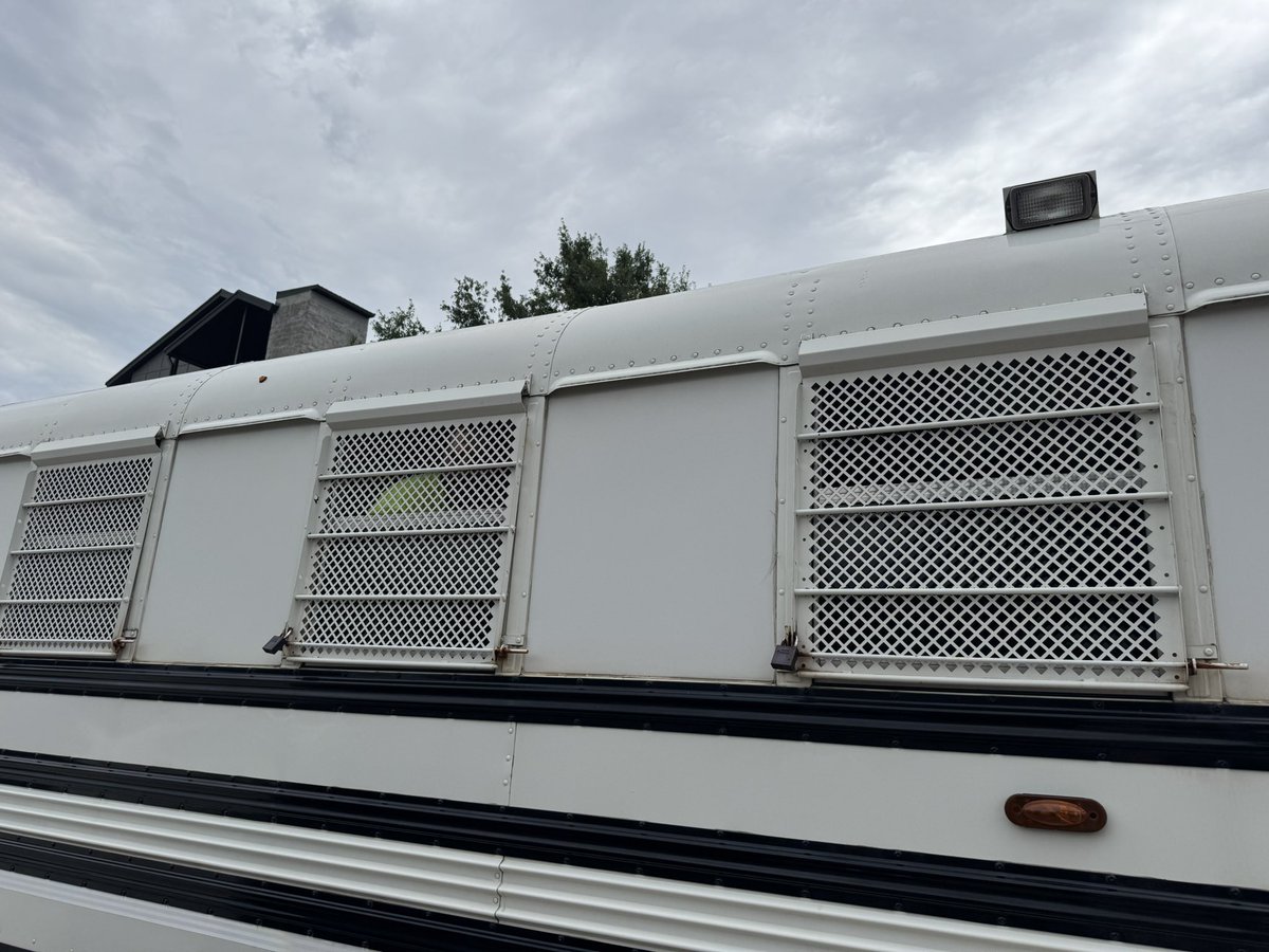 NEW: At least 30 people have been detained during an ICE raid at a construction site for off-campus student housing at Florida State University in Tallahassee. 

Detainees are being held inside a white bus  with barred windows. One says he has residency.