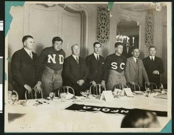 InsideUSC's tweet photo. Imagine a rivalry that could get Babe Ruth and Lou Gehrig to dress up as players the night before the game. Among those also in picture: Knute Rockne (Notre Dame coach), Howard Jones (USC coach) and Pop Warner (Stanford coach). https://t.co/5bNAKryPhs
