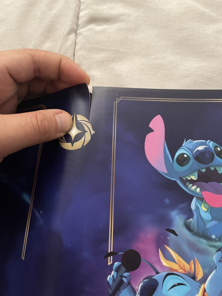 RockSaltLife's tweet photo. @DisneyLorcana bought the Stitch Gift set for my partners birthday today. Opened it up and the cardholder was damaged seemingly a manufacturing defect? https://t.co/i7yDPCfNpN