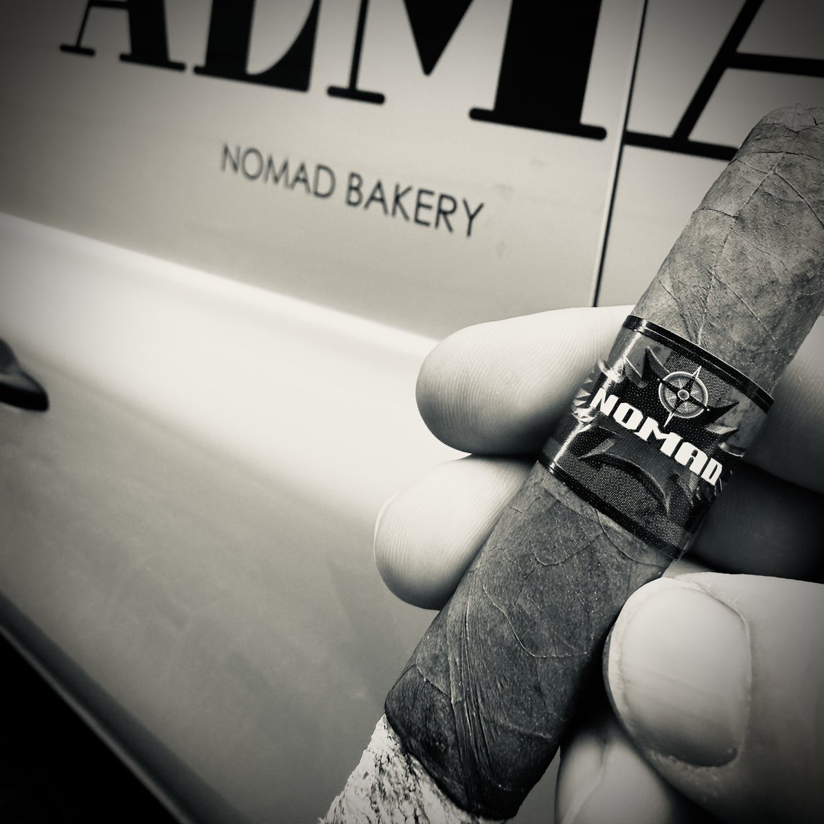 Sadly, I have very few Nomads left. This morning, while walking around the streets of Madrid, I decided to light one up. When trying to take a photo of the cigar and a beautiful backdrop of buildings, this truck pulled up and stopped right in front of me. What are the odds?