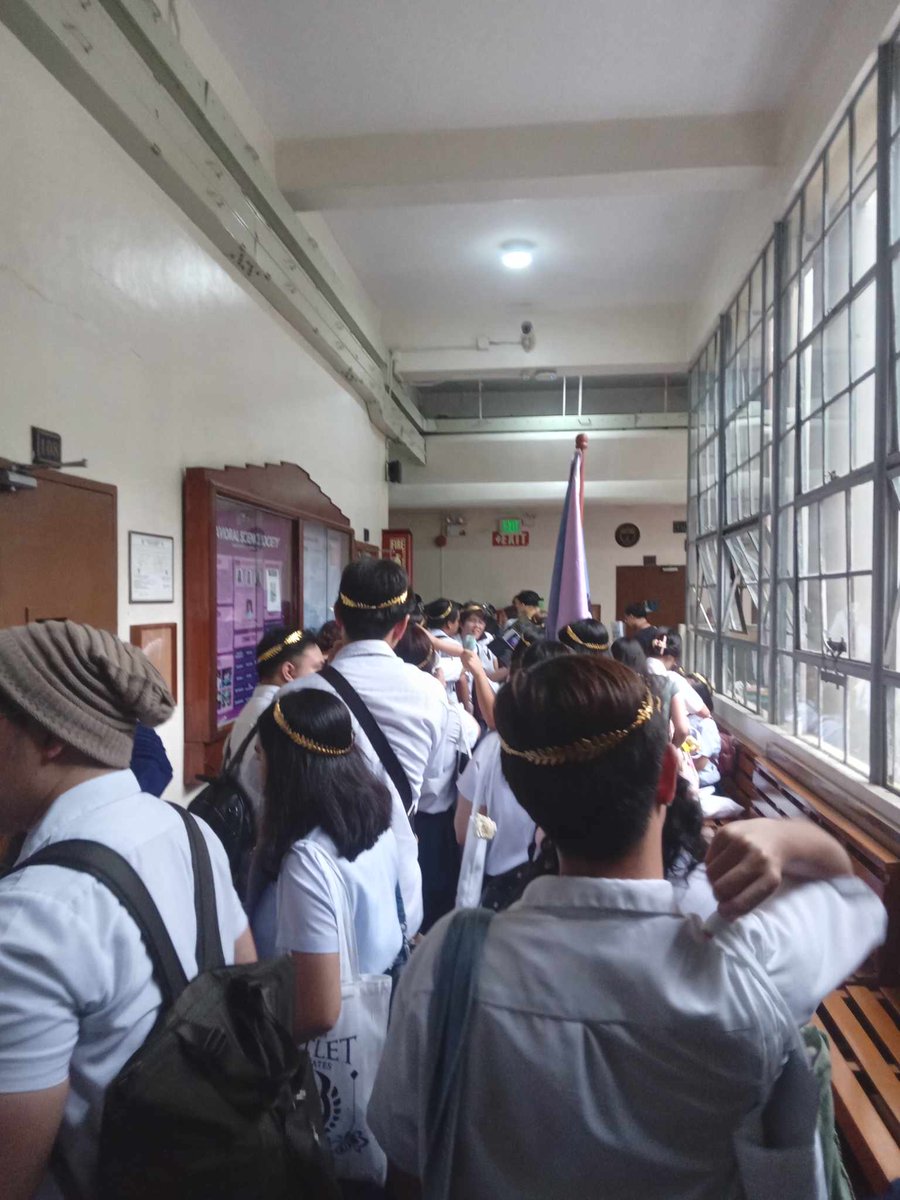 MaKathaUST's tweet photo. HAPPENING NOW: The march towards the Grand Stand and Field will commence soon! ☀️🔥

Creative Writing Seniors and other Faculty of Arts and Letters Seniors are lining up outside their respective holding areas for mobilization. https://t.co/xhJ5bt6x0p