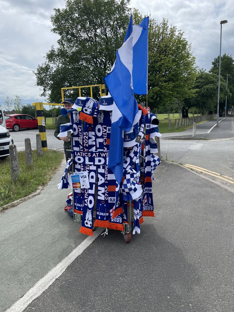 Anybody needing  any Wembley Gear , Bucket Hats , Scarves , Air Horns , Car Park opposite Holden Fold Lane , he’s there until 6pm and tomorrow from 8am , no flags but will have them tomorrow #oafc