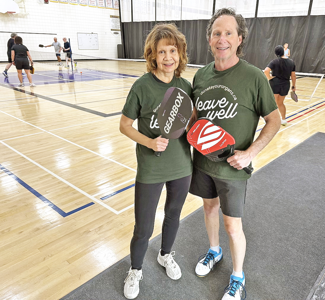 Volunteer Kelly with sporty companions Grace &amp; Terry wore their #LeaveWell tees for South Interlake 55 Plus #pickleball. All are connected to donation &amp; transplantation and wanted to make a statement about the power of organ donation. signupforlife.ca