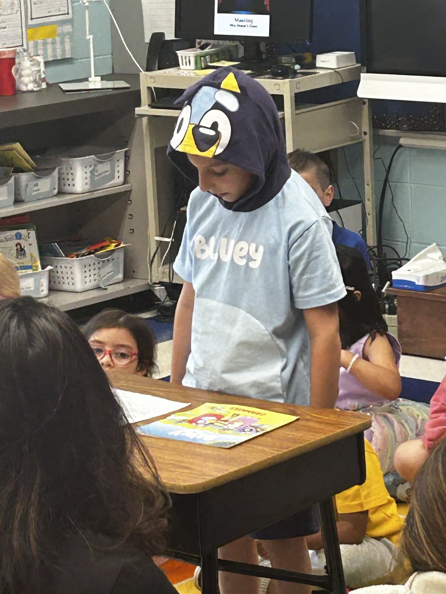 First graders in Mrs. Weber’s class have their ‘Fiction Finale’ performing as their favorite fictional characters. Meet Bluey and Gerald!