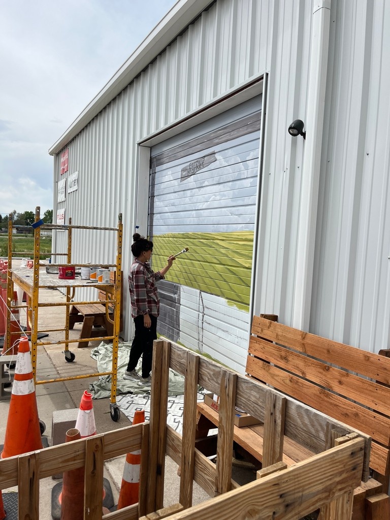 You may have noticed some of the wonderfully talented artists beautifying our space lately!

Shout out to Nate, Haley, Linda, Mary and Daphne! Yall are the best. Thank you for gracing our walls, garages, and trailers with your creations!