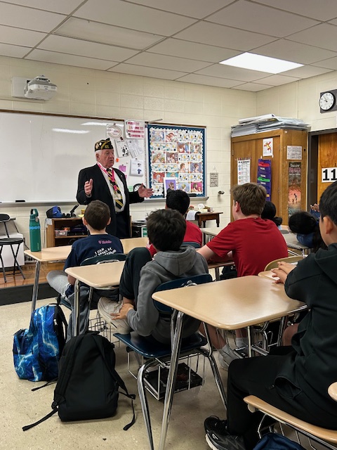 PrincipalHudock's tweet photo. Today was Veterans Day at WAMS. Our 6th-grade students spent the morning hearing historical war stories from the six Veteran guests and seeing authentic military uniforms from multiple eras. We concluded the morning by thanking the veterans for their service to our country. https://t.co/Rt1p7Svbka