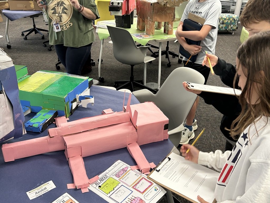 Welcome to the Volume Zoo! Mrs. Alonso's 5th grade Mathematicians created their own animals out of cardboard.  In addition to researching facts about their animal, students calculated their creation's volume and area. #lionspride #mendhamborosd
