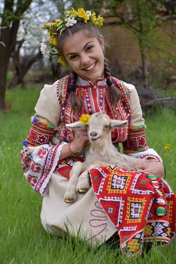 Bulgarian girl in folk clothing.