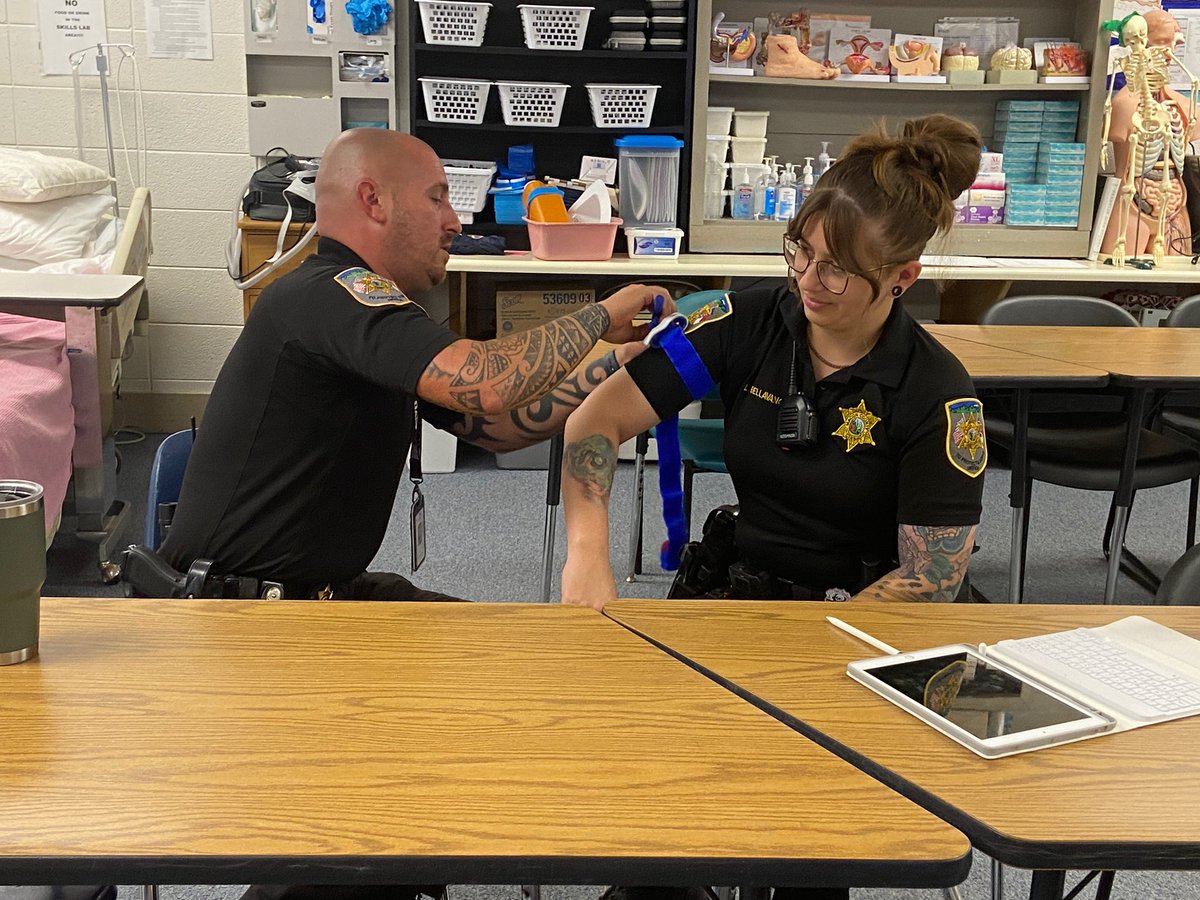 MLeedsRN's tweet photo. Health Science classroom has some different students today! Michele Kussow, Macon County, teaching School Resource Officers STOP the BLEED! Thank you for your awesome contribution to your community &amp; to the SROs we thank you for protecting schools! @CTEforNC https://t.co/iyslSUaDhR