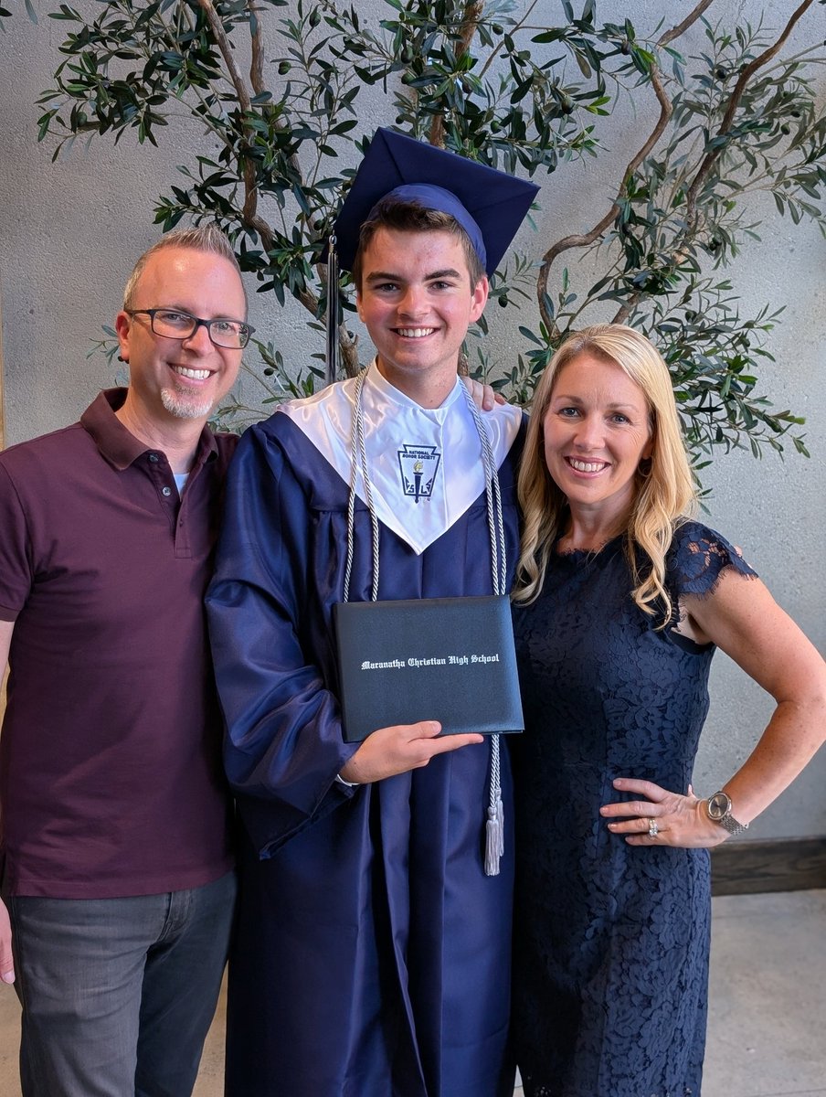 I now have a high school graduate. No, YOU'RE crying. We're really proud of him.