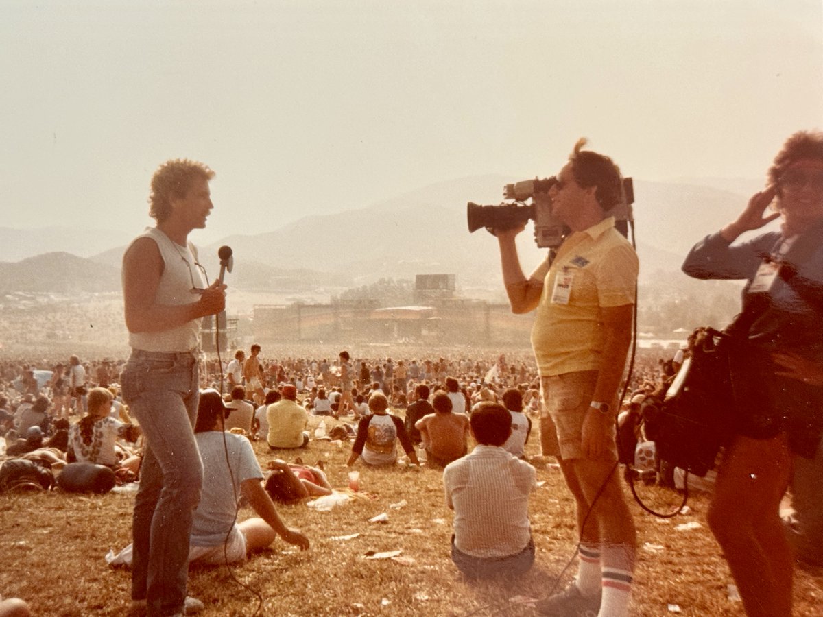 GroundZeroMktg's tweet photo. @91X I was with KGTV in San Diego at the time and we were there for all three days to cover it. That's reporter Bob Donelly reporting from the hot and dusty festival grounds. https://t.co/uZSsGnl5Pp