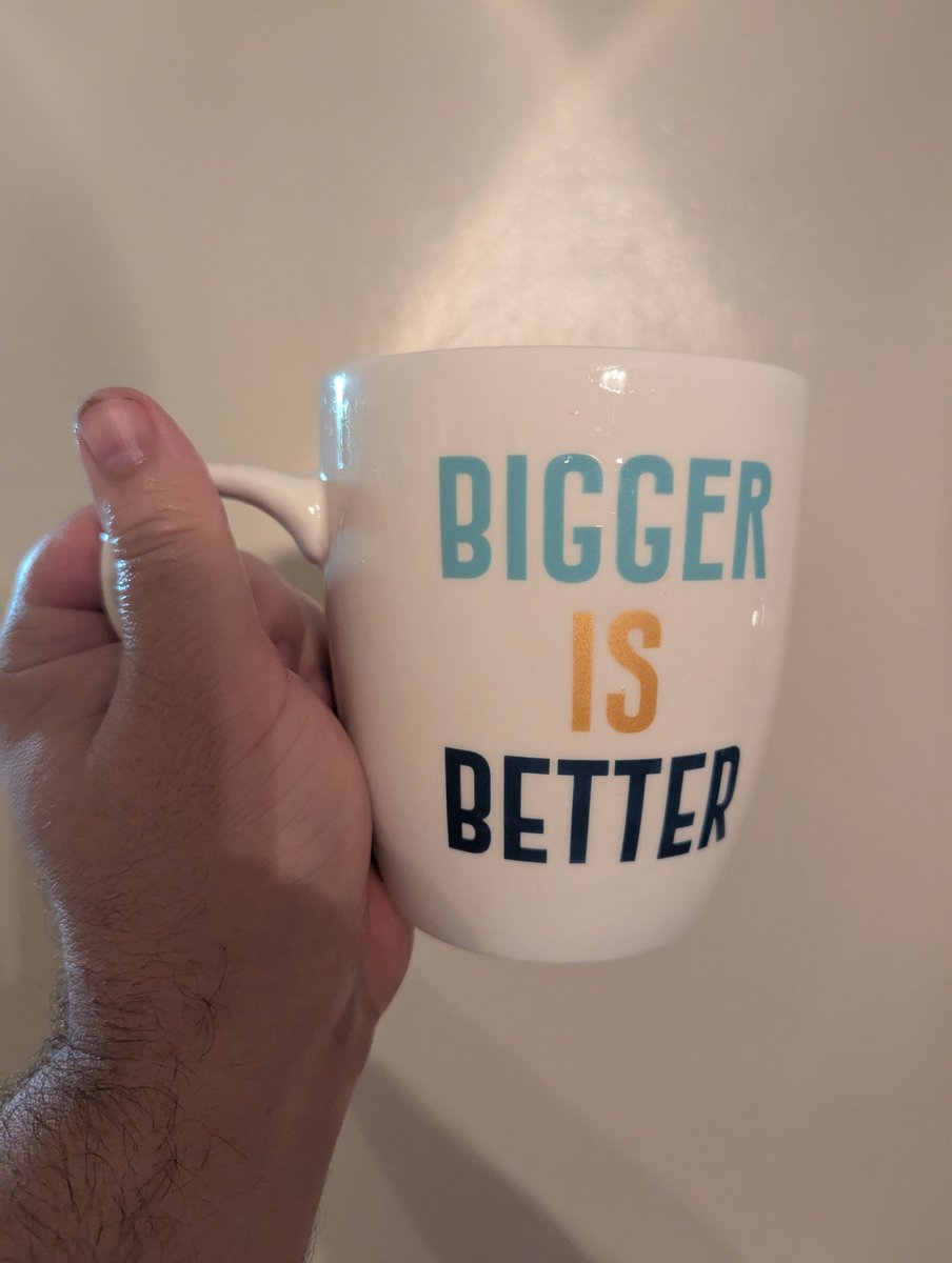 Sometimes I do something that makes me feel big. For example... That's my hand next to a double sized coffee mug. It's kinda fun to be so big that XXL stuff is relatively an M or an L to me. Now... If only that size were muscle...