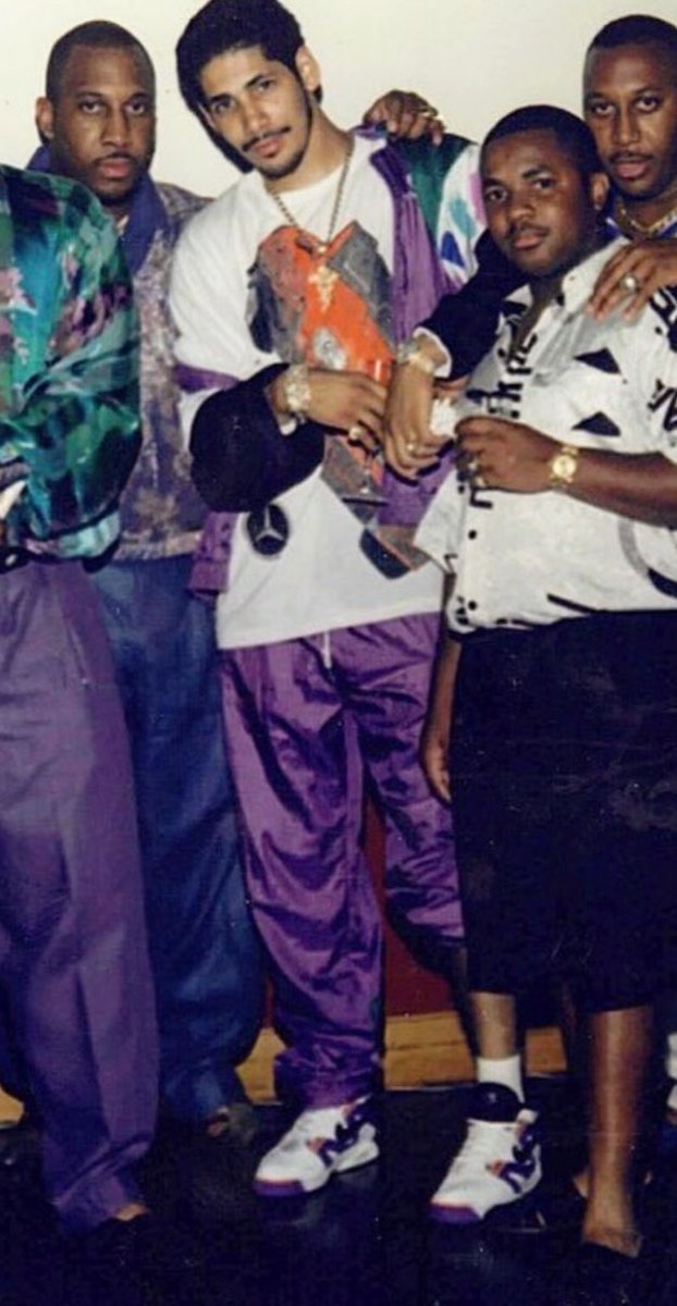 LadePlatinum's tweet photo. No they didn’t. It was from drug dealers. This is Jesus from Brooklyn rolling one pant leg up in 1992. Sergio Tacchini Tracksuit and Nike Agassi Pro 4s

LL didn’t start rolling one pant leg up til 1995 https://t.co/LShzvJrYIM