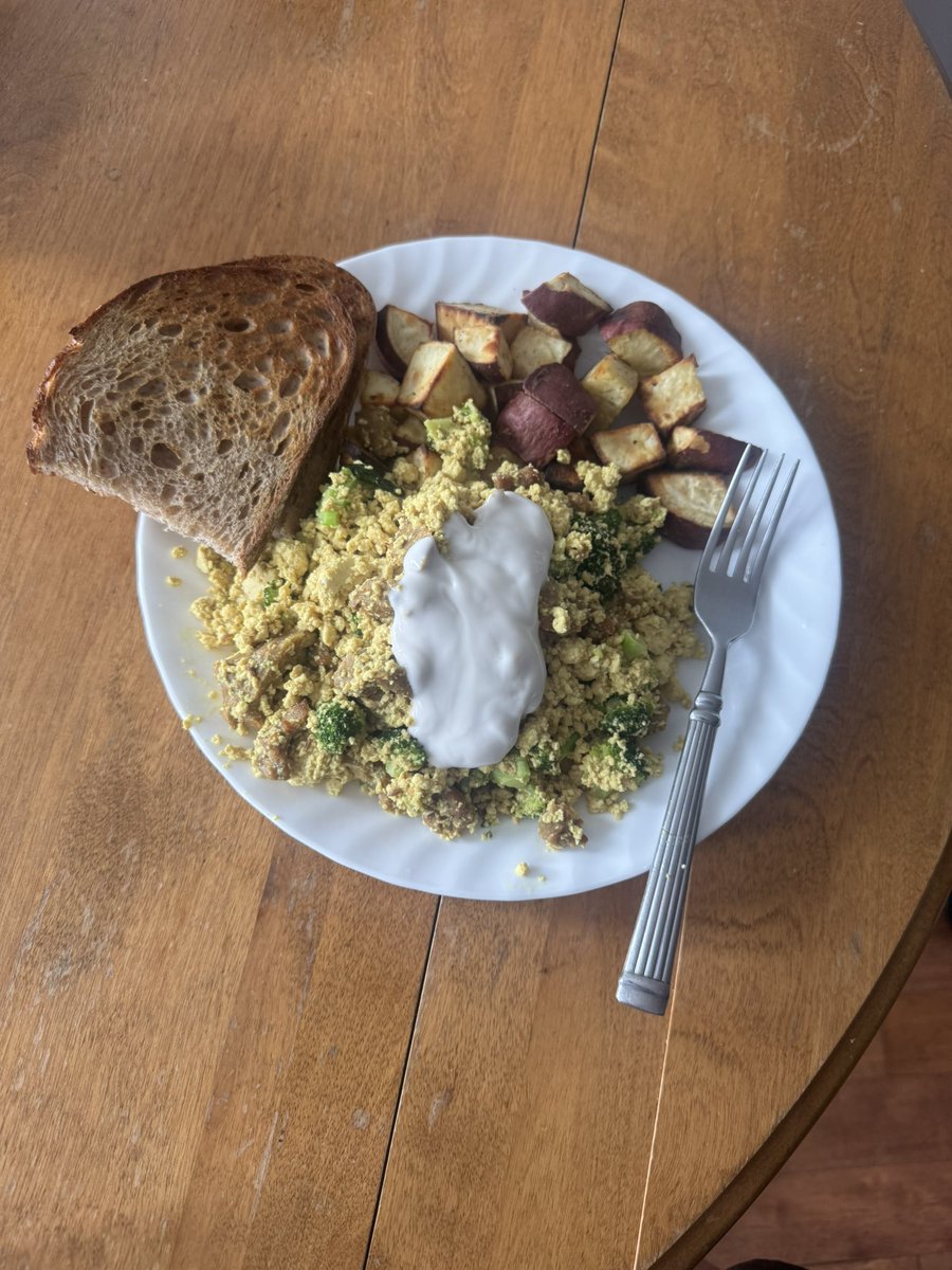 Power brunch. Made tofu scramble with broccoli and crispy seitan - topped with Forager brand cashew sour cream - roasted Japanese sweet potatoes and local sourdough bread. All 100% organic.
