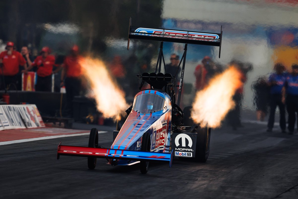 TonyStewart's tweet photo. Opened Q1 clean and snagged the number two spot. Took a healthy swing in Q2 and aborted the run with a feeling I'd not felt before. Sitting P6 going into today’s qualifying as we try to dodge the rain drops and run the @missionfoodsus #2Fast2TastyChallenge. ☔ 

@OfficialMOPAR @nhra 
@TSRnitro @Dodge

#TSRNitro #TopFuel #NHRA #Dodge #DirectConnection #Mopar #SRT #NewEnglandNats