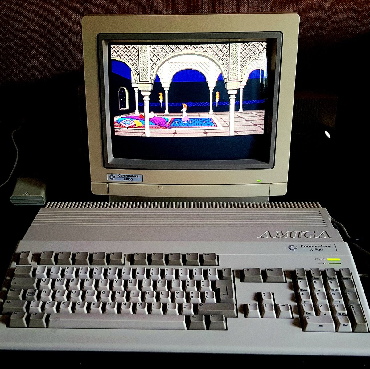 Prince of Persia intro, Amiga version.
The sounds are absolutely awesome, graphics too, but there's almost 1 second latency between joystick input and action. For this kind of game, where each pixel counts and where a fraction of a second can make the difference, it's a real con.