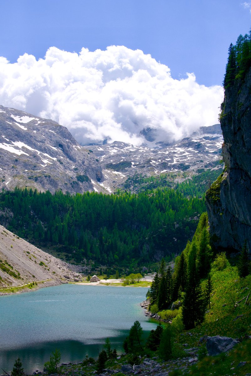 On the fourth day of our 5-day trek in the Slovenian Alps, we hiked up to Lake Krn from the Soča Valley beneath a flawless sky, winding past wildflower meadows and pastures with grazing cows and sheep.

Join our next guided hike: exploringslovenia.com/tours/krn-lake/