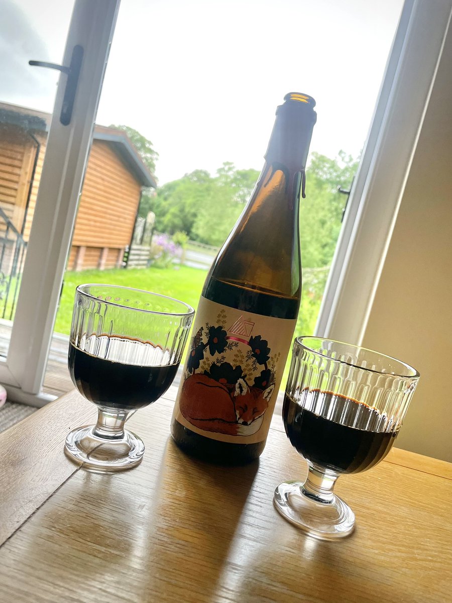 Sat chilling in a cabin in Wales, enjoying the views, and sharing a big bottle of boozy stout with my wife. Perfect evening away from home. 🍻