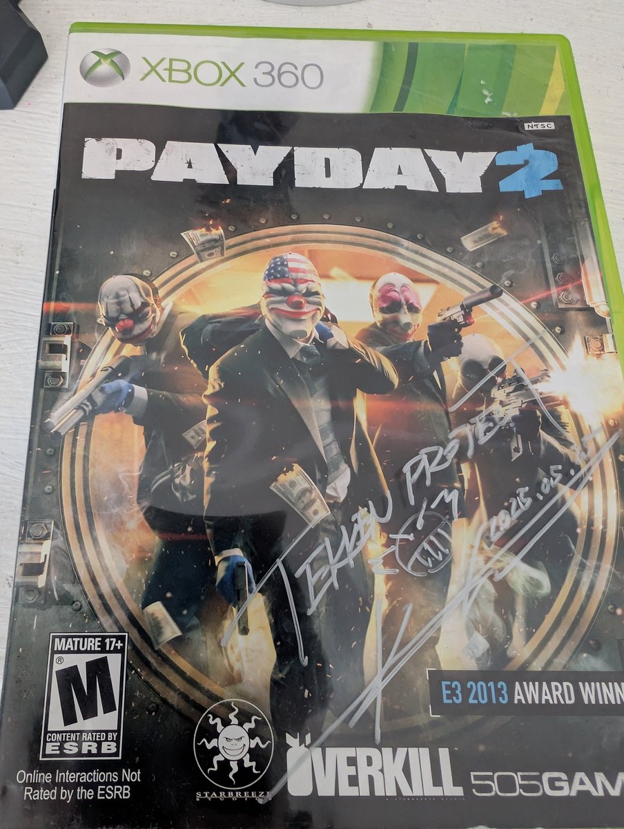 polarizeo's tweet photo. My buddy got @Harada_TEKKEN to sign his copy of Payday 2 at @COMBOBREAKER. "Ooh, Payday 2! I love this game!" https://t.co/FoOc7ogpir