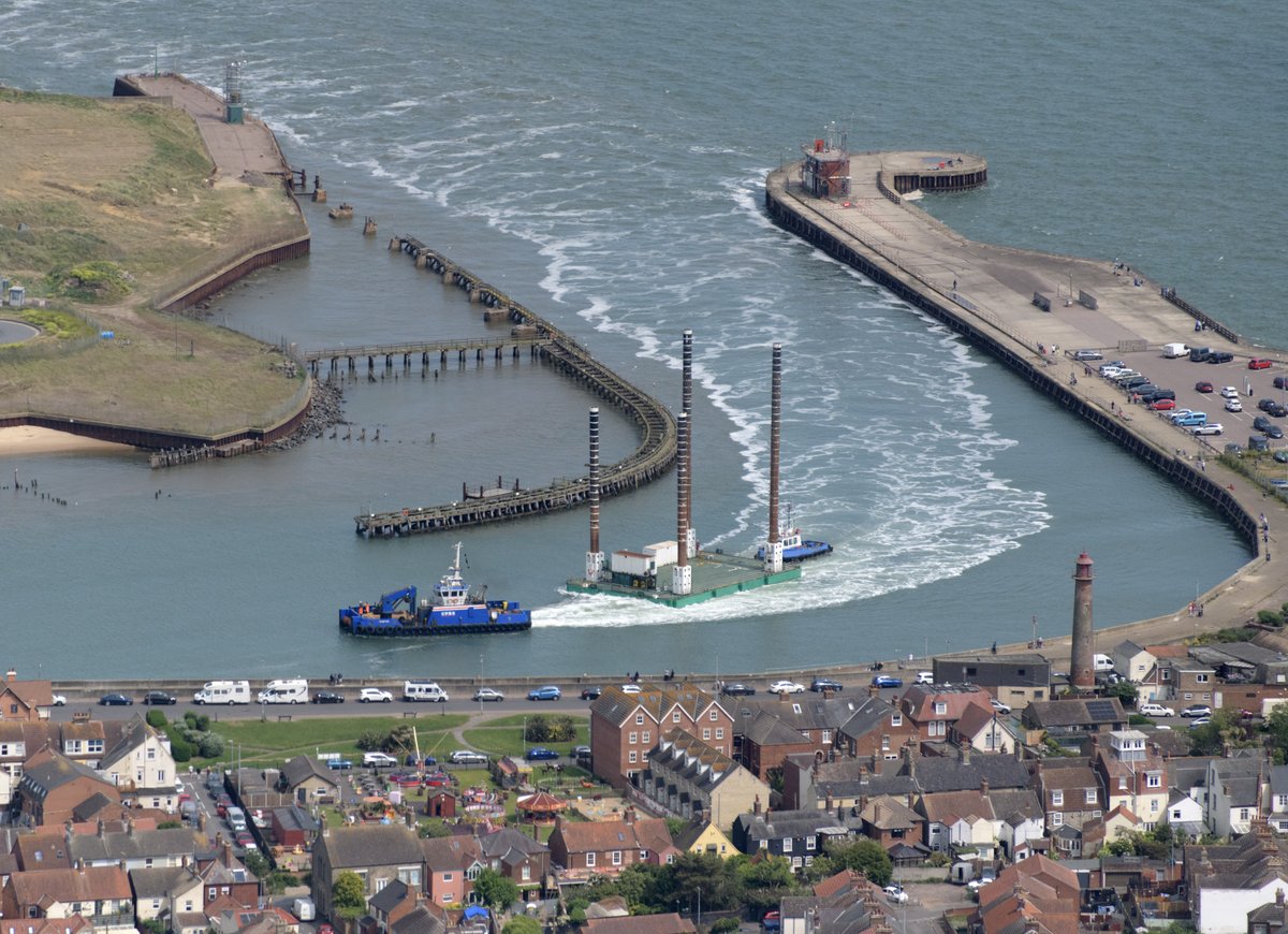 Gorleston aerial image - Offshore platform under tow from the CPBS multicat Hound Dog &amp; the TMS tug Christine. Entering the River Yare and Gt Yarmouth Harbour #GreatYarmouth #aerial #image #Norfolk #Aerialphotography