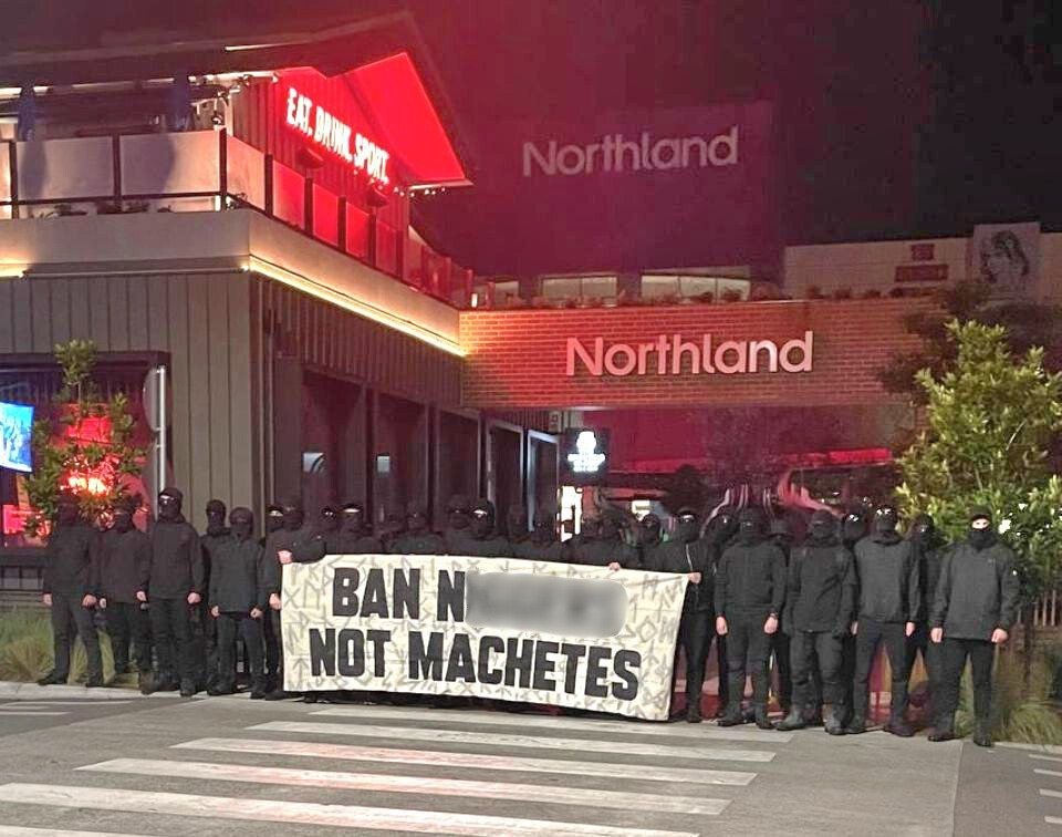 NoticerNews's tweet photo. Noticer News has obtained photos and video of the National Socialist Network protesting Victoria's machete ban last night outside Melbourne's Northland Shopping Centre, where an African gang fight erupted last weekend.

Follow: @NoticerNews https://t.co/ZZsLFFeKsm
