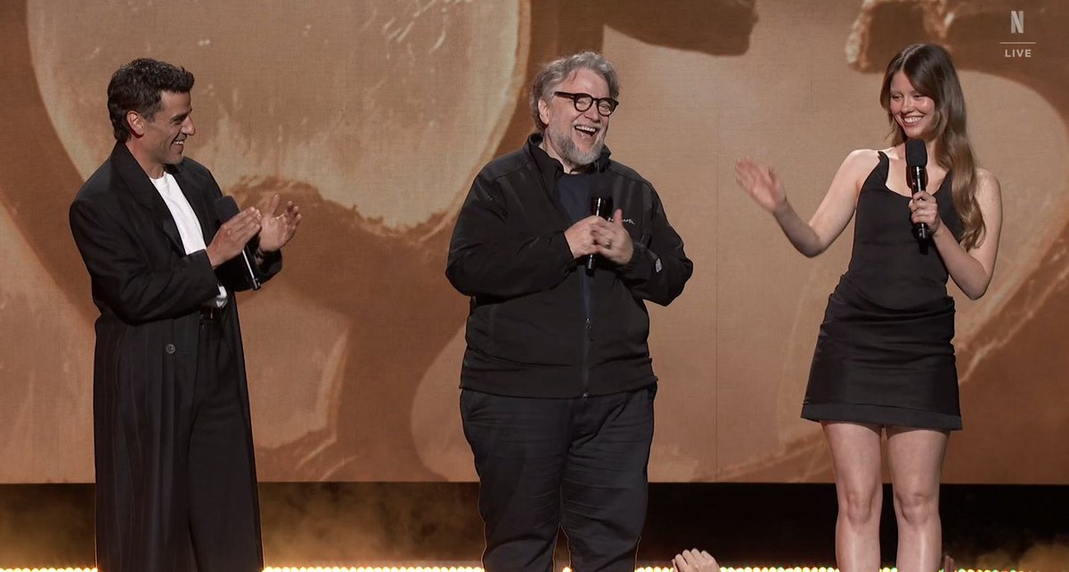 Guillermo Del Toro, Mia Goth and Oscar Isaac onstage at #TUDUM presenting: Frankenstein.