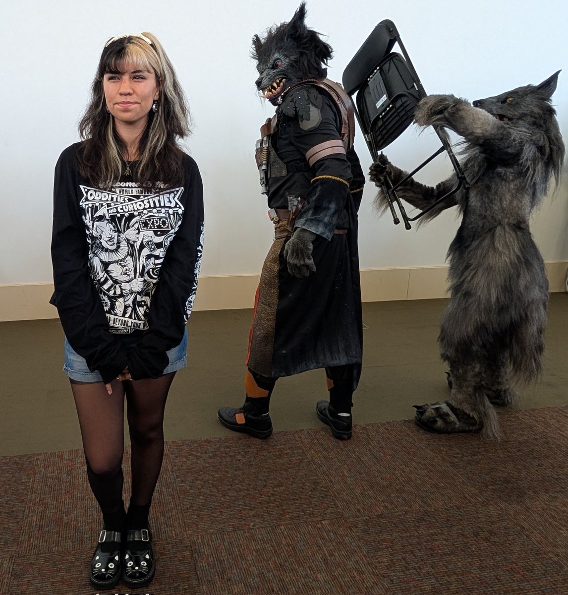 braxus's tweet photo. Fun monster photo of the day at #Monsterpalooza. If you know, you know. Featuring @paintyourdragon and 🦋capsaicincoffee. https://t.co/YTmtdHjlAV