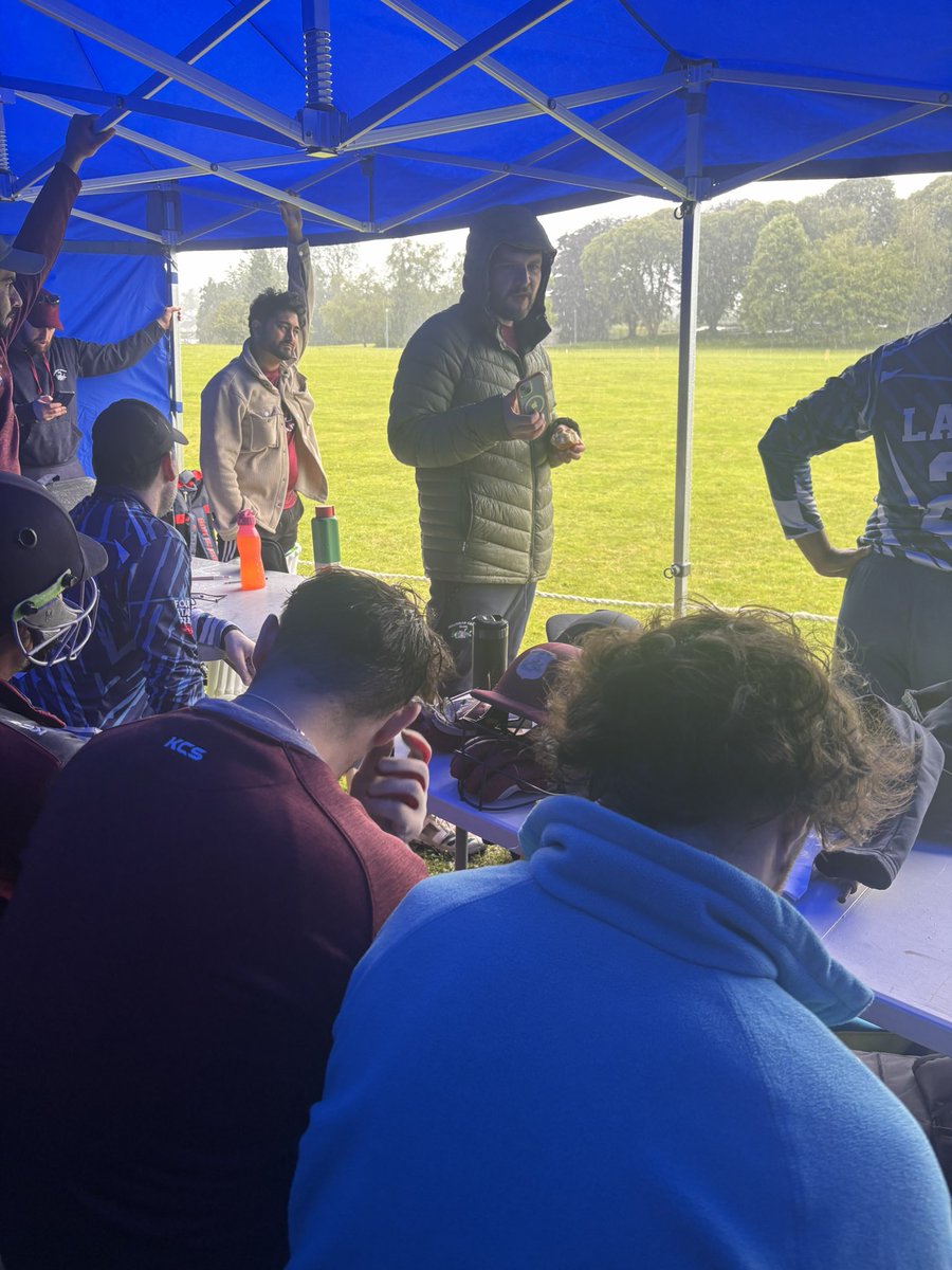 Cricket is back, 22 lads standing in a tent hiding from the rain