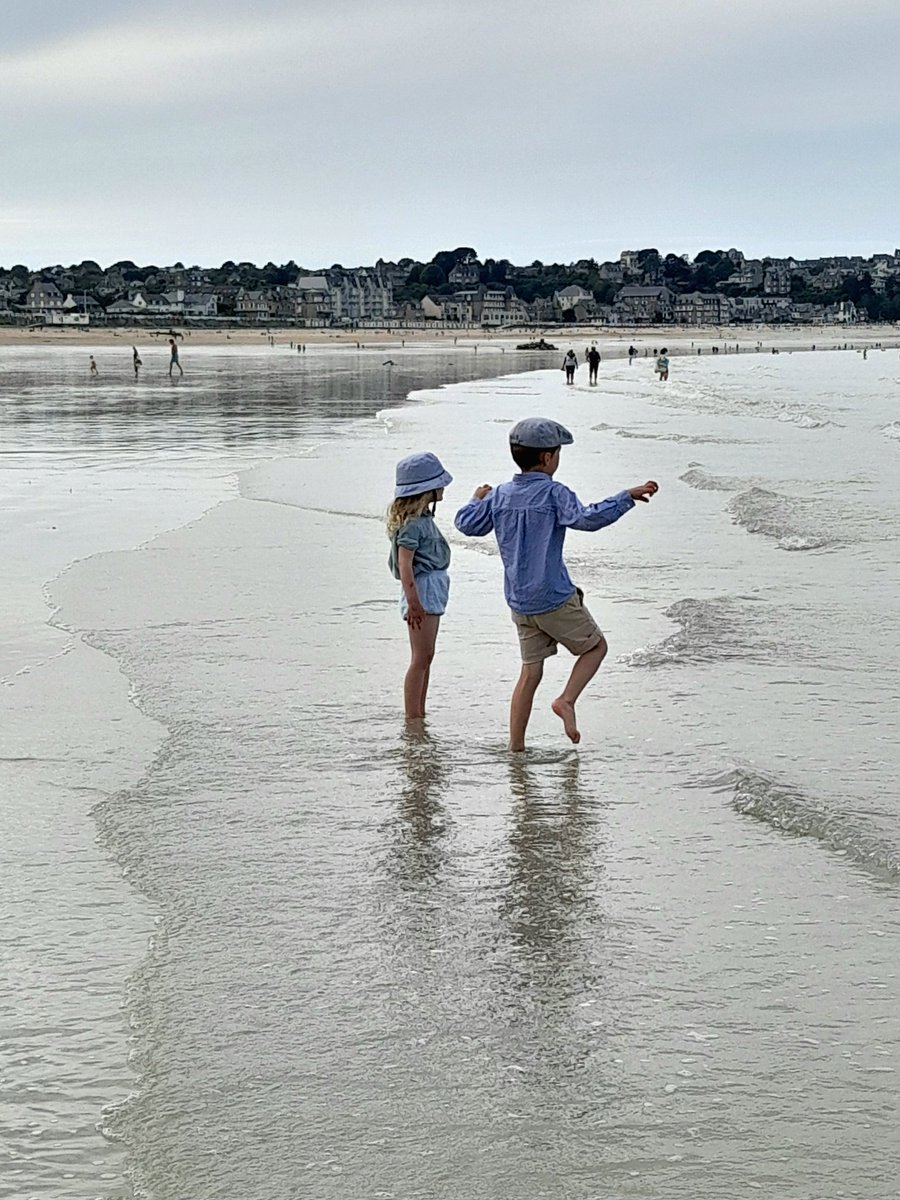 Colombel3's tweet photo. Childhood Joy
Two tiny tots, with hats so neat,
Paddling where the waves do meet.
Barefoot steps on sandy gleam,
Living out a seaside dream. https://t.co/cQML1O7AjB