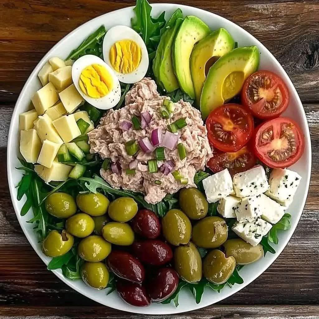Eat or pass?

Mediterranean Tuna Salad Bowl with Fresh Veggies &amp; Feta 🥗🐟

Here’s a quick recipe for those who want to try!

For the Tuna Salad:

🐟 Canned Tuna: 1 can (5 oz), drained
🧅 Red Onion: 2 tbsp, finely chopped
🥄 Mayonnaise: 2 tbsp (or Greek yogurt for a lighter