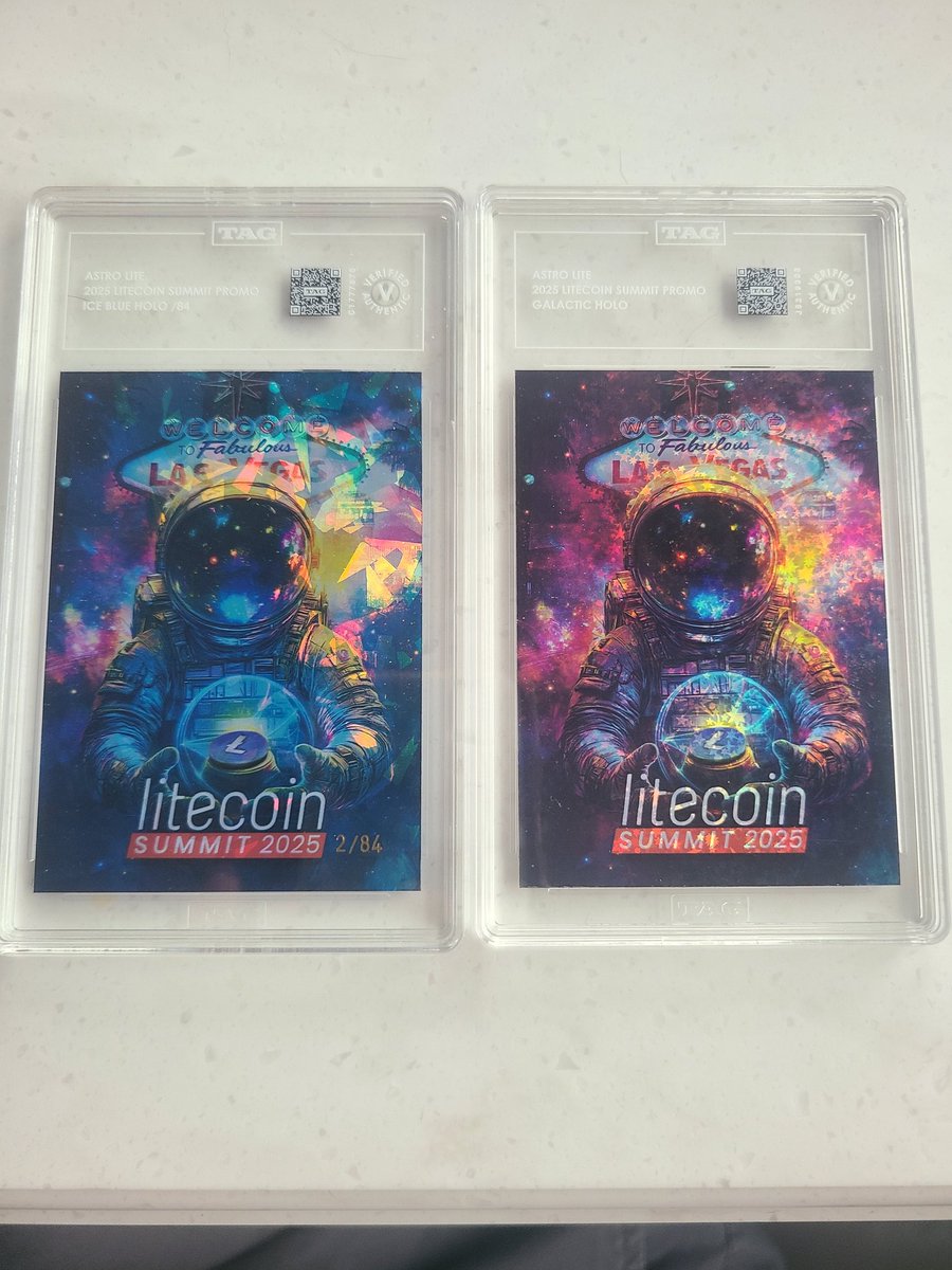 The wife and I both got a holo card, but one is numbered to /84. Who gets the blue card? 😀