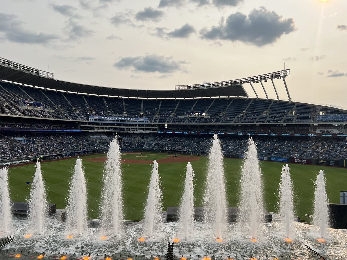 JakeWieds's tweet photo. Ballpark #19 - Kauffman Stadium! Easily the best of the trip and one of our absolute favorites. Beautiful stadium and fountains are one of the top features we’ve seen at any stadium. Add a hot dog with pulled pork and crushed Doritos on it and it has my heart!! https://t.co/sPMAHJuJb0