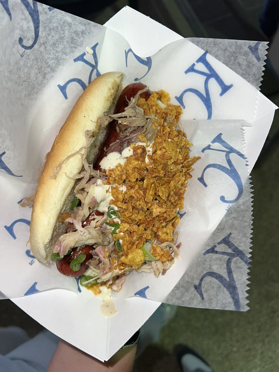 JakeWieds's tweet photo. Ballpark #19 - Kauffman Stadium! Easily the best of the trip and one of our absolute favorites. Beautiful stadium and fountains are one of the top features we’ve seen at any stadium. Add a hot dog with pulled pork and crushed Doritos on it and it has my heart!! https://t.co/sPMAHJuJb0