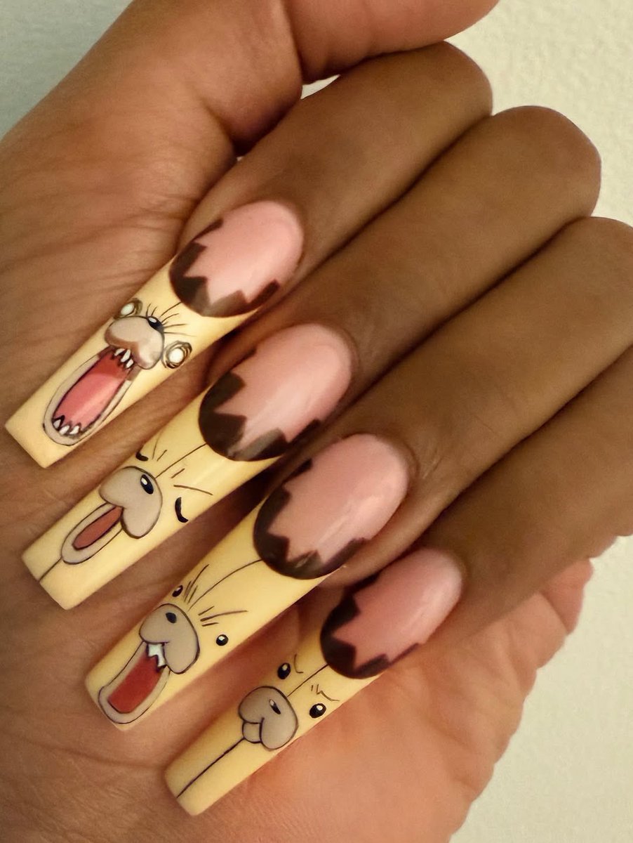 A closer look at Megan Thee Stallion’s nails for her Yoruichi cosplay at DreamCon!