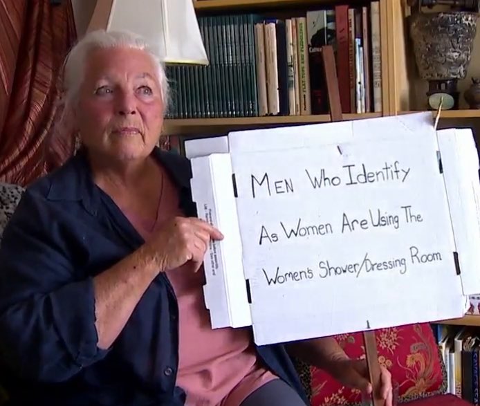 An 80 year old woman who tried to throw out a man, who said he was a woman, changing inside of the women’s changing room which had minors undressing, at a local swimming pool got herself banned! 

She then held this sign outside of the pool for 2 days straight warning other women