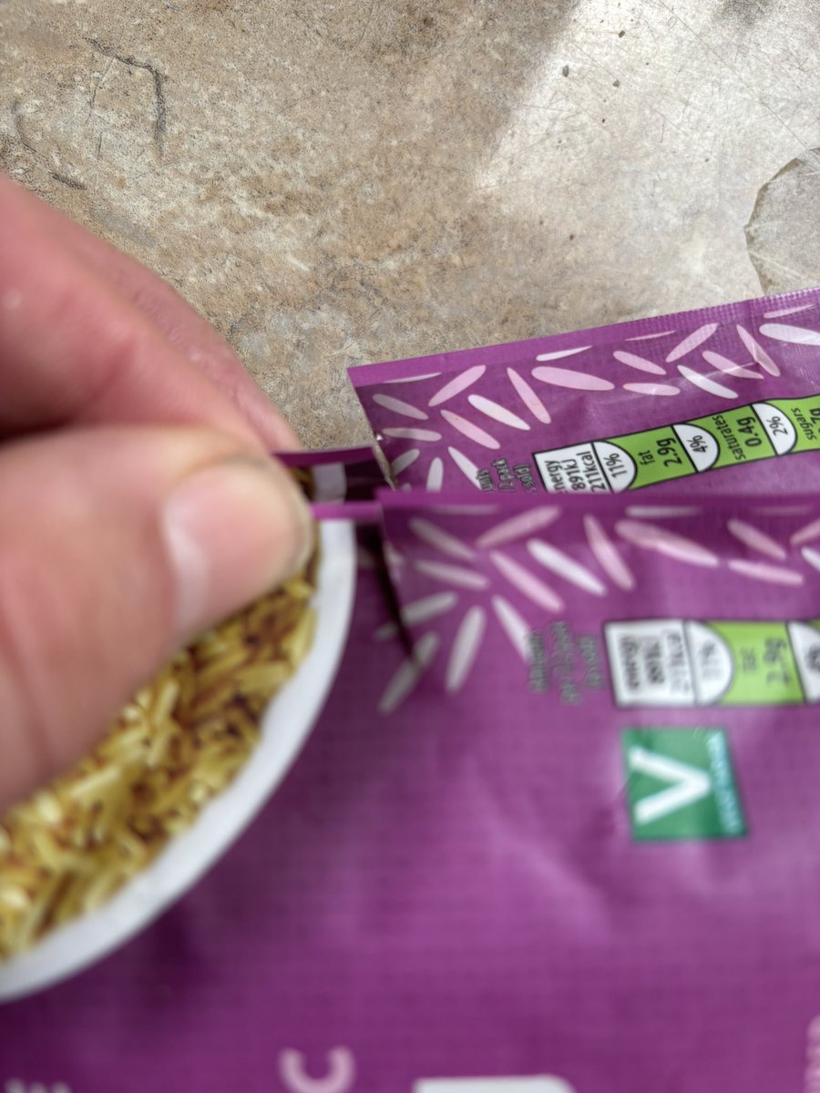 DMDeagle's tweet photo. @AldiUK what is going on with your bags of rice? I think boxes are being opened with a knife https://t.co/JXpCNcSlS2