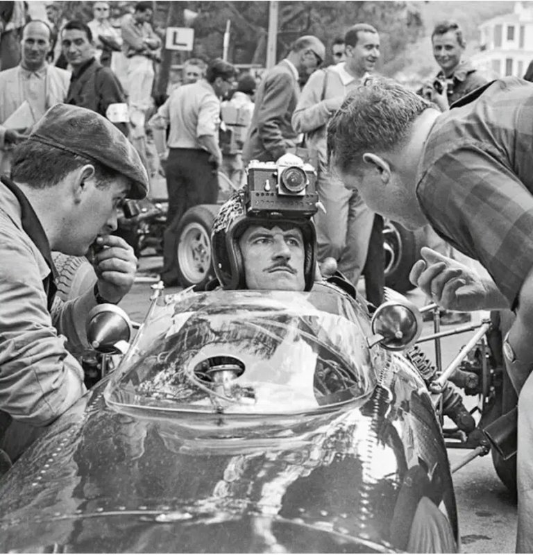 Nikon F camera attached to the helmets of  Graham Hill and Jackie Stewart (at the 1966 Monaco GP?)